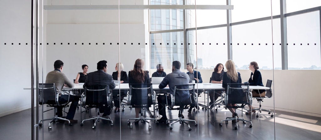 People sitting in a conference room