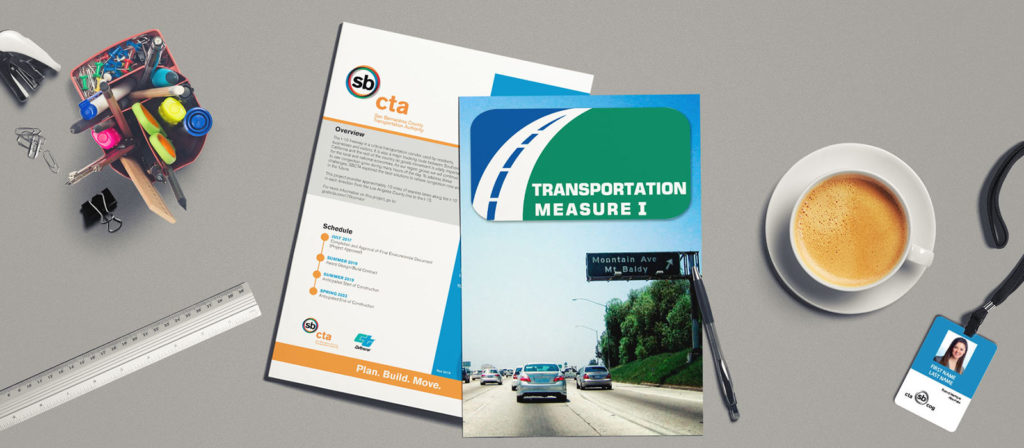 Image of Transportation Measure 1 Document on the table with other documents, name card, ruler, and other accessories and coffee